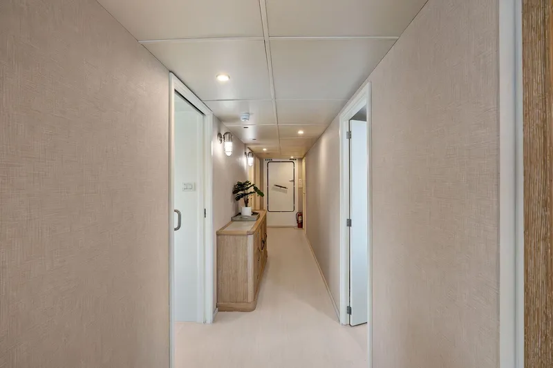 Pegasus Ix Yacht Photos Pics Modern hallway on a 2004 Sabre 92 yacht with sleek design and ambient lighting.