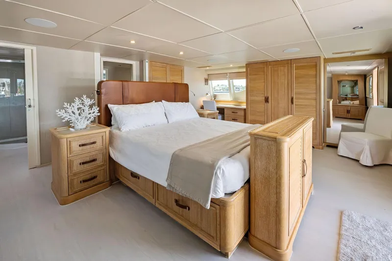 Pegasus Ix Yacht Photos Pics Luxurious bedroom interior on 2004 Sabre 92 yacht with elegant wooden furnishings.