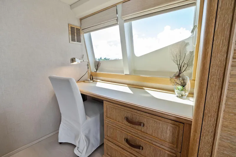 Pegasus Ix Yacht Photos Pics Cozy workspace on 2004 Sabre 92 yacht with natural light and elegant decor.