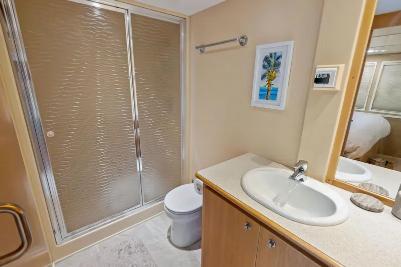 Pegasus Ix Yacht Photos Pics Bathroom in 2004 Sabre 92 yacht with shower, sink, and toilet.