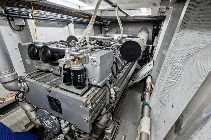 Pegasus Ix Yacht Photos Pics Engine room of a 2004 Sabre 92 yacht, showcasing detailed machinery and components.