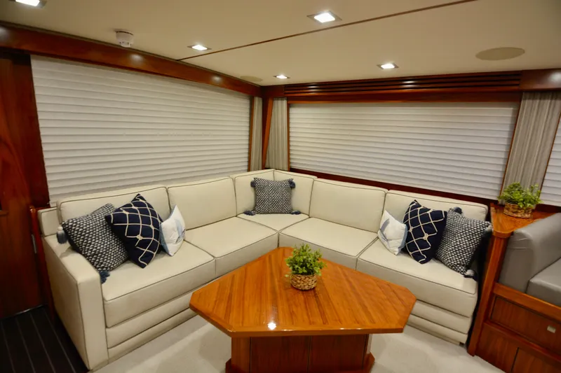 Slow Your Roll Yacht Photos Pics Luxurious interior of 2019 Viking 68 Convertible yacht with elegant seating and decor.