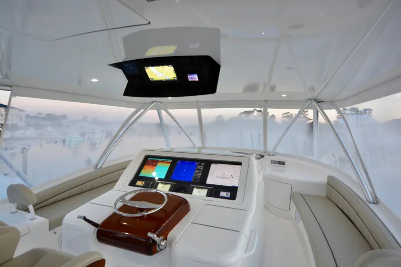 Slow Your Roll Yacht Photos Pics Interior of 2019 Viking 68 Convertible yacht with advanced navigation system.