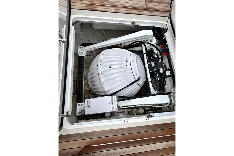 Slow Your Roll Yacht Photos Pics Engine compartment of 2019 Viking 68 Convertible yacht, showcasing mechanical components.