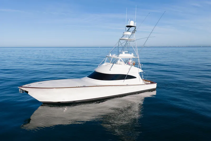 Slow Your Roll Yacht Photos Pics 2019 Viking 68 Convertible yacht on calm ocean waters.