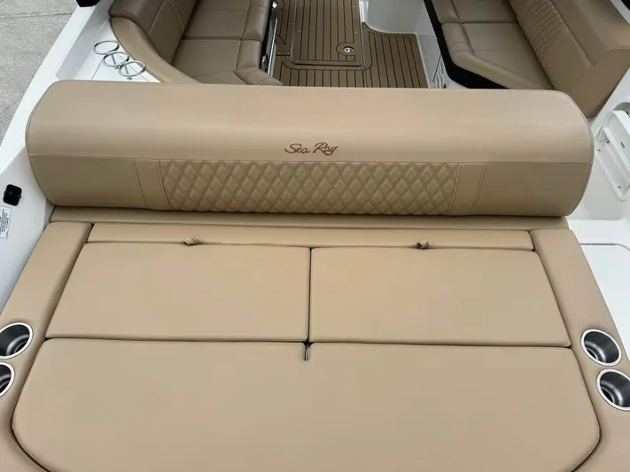  Yacht Photos Pics 2021 Sea Ray SLX 280 boat interior with tan leather seating and cup holders.
