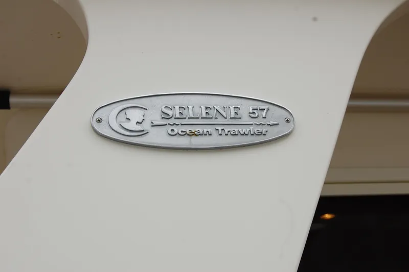 Blue Red Yacht Photos Pics Nameplate of 2006 Selene Pilothouse Ocean Trawler on boat exterior.