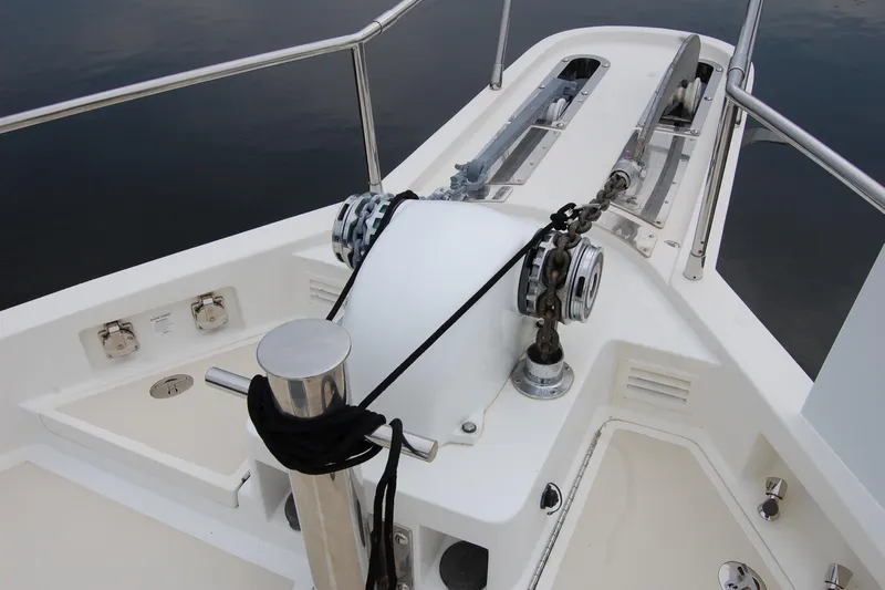 Blue Red Yacht Photos Pics 2006 Selene Pilothouse Ocean Trawler anchor system with chain and winch on deck.