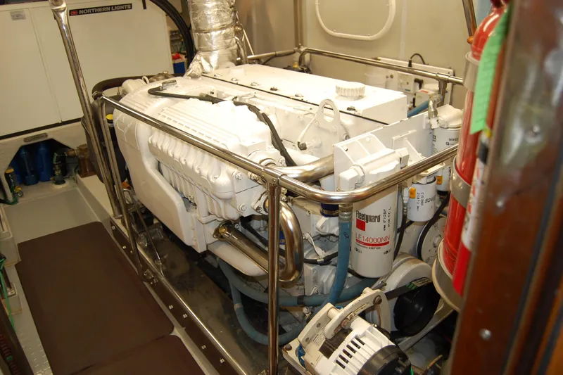 Blue Red Yacht Photos Pics Engine room of 2006 Selene Pilothouse Ocean Trawler with visible machinery and equipment.