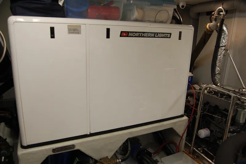 Blue Red Yacht Photos Pics Engine room of 2006 Selene Pilothouse Ocean Trawler with Northern Lights generator.