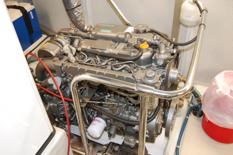 Blue Red Yacht Photos Pics Engine room of 2006 Selene Pilothouse Ocean Trawler, showcasing detailed machinery components.