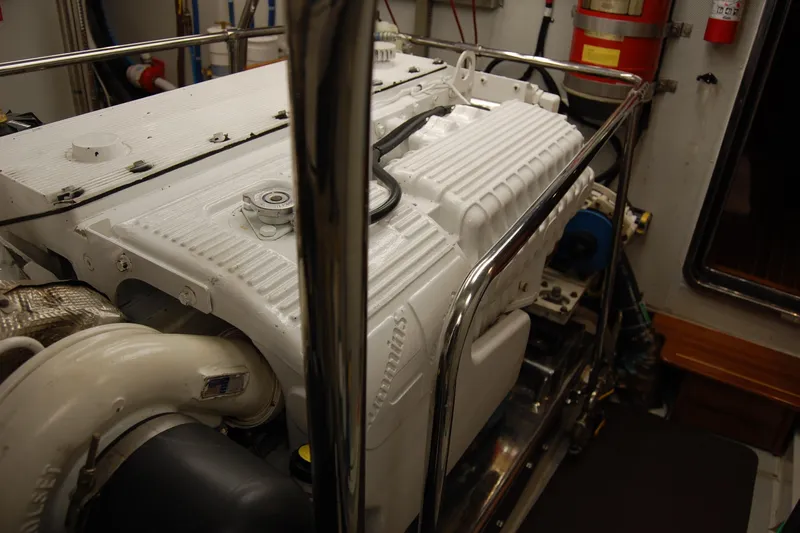 Blue Red Yacht Photos Pics Engine room of 2006 Selene Pilothouse Ocean Trawler with visible machinery and safety equipment.