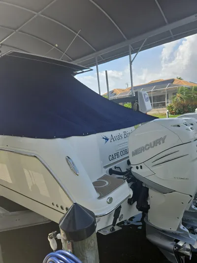  Yacht Photos Pics 2016 Boston Whaler 345 Conquest boat with Mercury engine, covered and docked in Cape Coral.