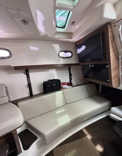  Yacht Photos Pics Interior of 2016 Boston Whaler 345 Conquest with seating and TV.