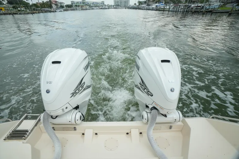  Yacht Photos Pics 2019 Grady-White Canyon 336 with twin Yamaha outboard engines on water.