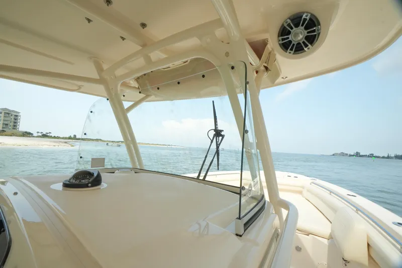  Yacht Photos Pics 2019 Grady-White Canyon 336 boat interior with ocean view and clear skies.