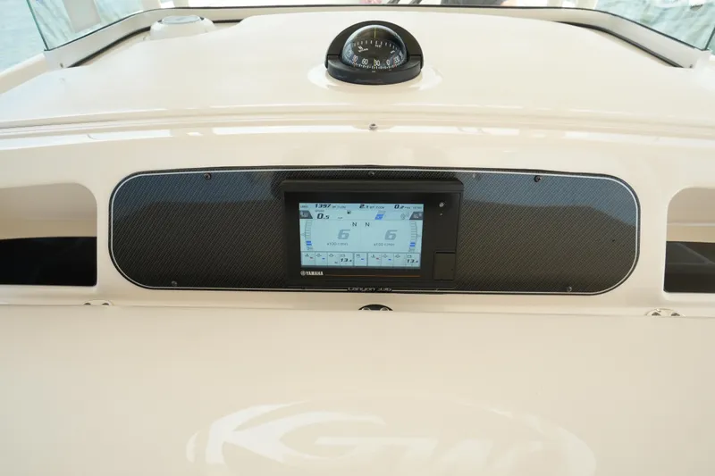  Yacht Photos Pics 2019 Grady-White Canyon 336 dashboard with navigation display and compass.