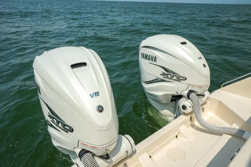  Yacht Photos Pics 2019 Grady-White Canyon 336 with twin Yamaha V8 outboard engines on open water.
