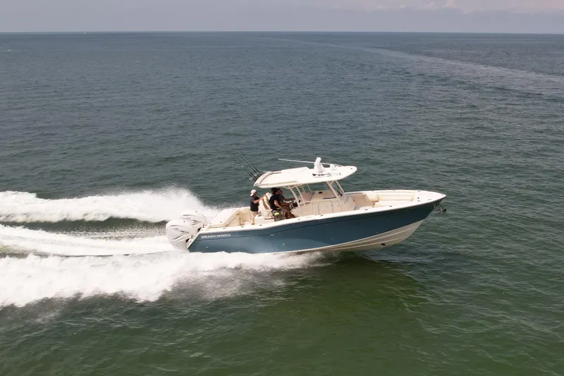  Yacht Photos Pics 2019 Grady-White Canyon 336 boat cruising on open water.