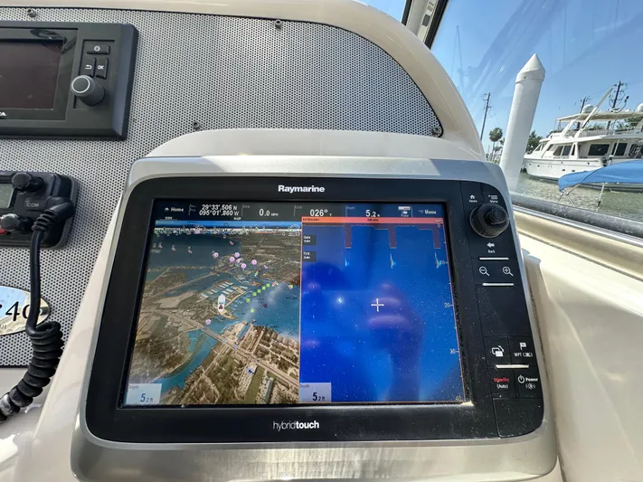 Hula Girl Yacht Photos Pics Raymarine navigation system on 2007 Chris-Craft Roamer 40 yacht, displaying maps and sonar.