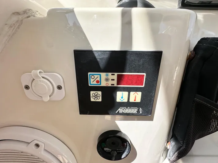 Hula Girl Yacht Photos Pics Control panel on a 2007 Chris-Craft Roamer 40 boat, featuring various function icons.