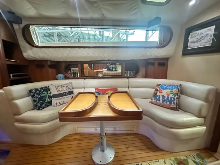 Hula Girl Yacht Photos Pics Luxurious interior of 2007 Chris-Craft Roamer 40 yacht with plush seating and decorative pillows.