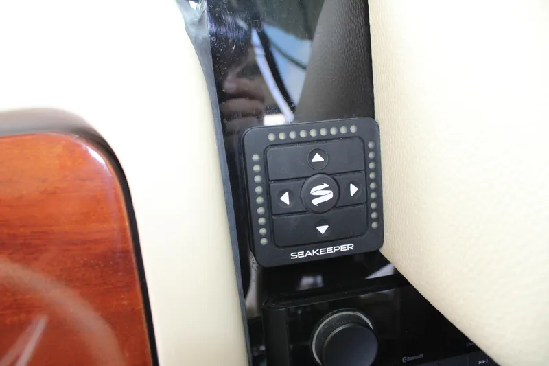 America Yacht Photos Pics Seakeeper control panel on 2023 Chris-Craft Launch 31 GT boat dashboard.