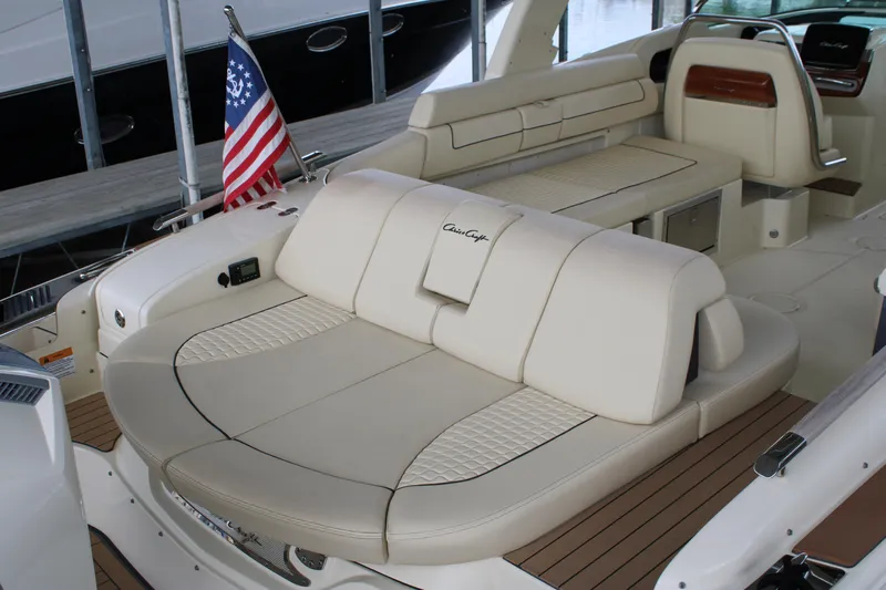 America Yacht Photos Pics 2023 Chris-Craft Launch 31 GT boat interior with luxurious seating and American flag.