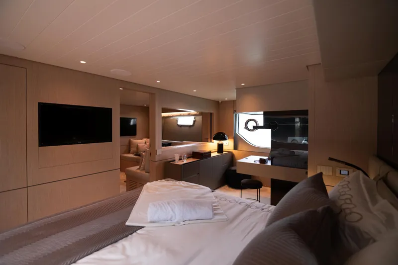  Yacht Photos Pics Luxurious interior of 2022 Bluegame BGX70 yacht with modern furnishings and ambient lighting.