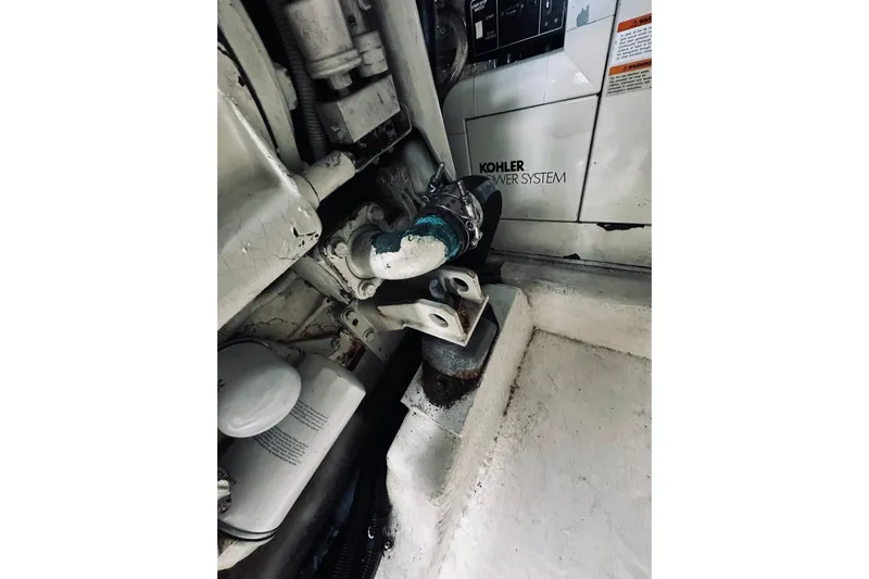 Rah Rah Yacht Photos Pics Engine compartment of a 2000 Riviera 40 with Kohler power system components.