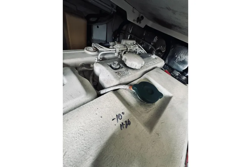 Rah Rah Yacht Photos Pics Engine compartment of a 2000 Riviera 40 boat, showing detailed components.