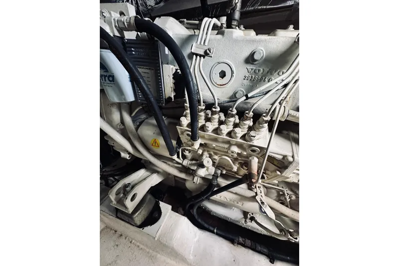 Rah Rah Yacht Photos Pics Engine of a 2000 Riviera 40 boat, featuring Volvo components and intricate wiring.