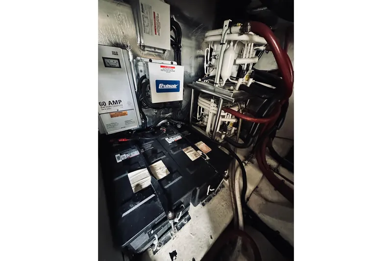 Rah Rah Yacht Photos Pics Engine room of 2000 Riviera 40 with batteries and electrical components.