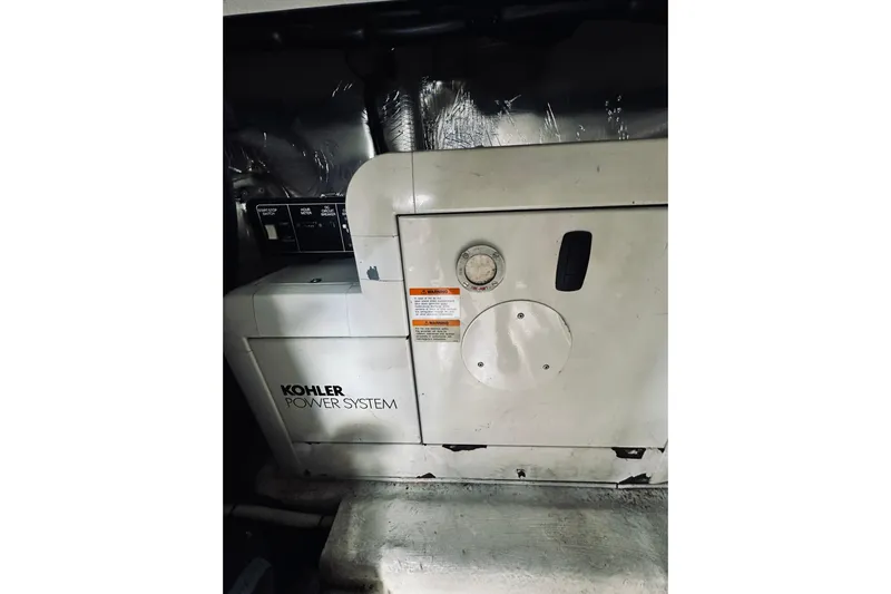 Rah Rah Yacht Photos Pics Kohler power system in 2000 Riviera 40 yacht engine room.