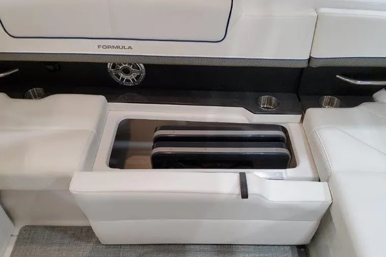 310 Bow Rider Yacht Photos Pics Interior of Formula 310 Bowrider I/O 2025 with seating and speaker.