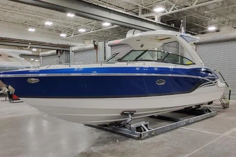 310 Bow Rider Yacht Photos Pics 2025 Formula 310 Bowrider I/O boat in a shipyard.