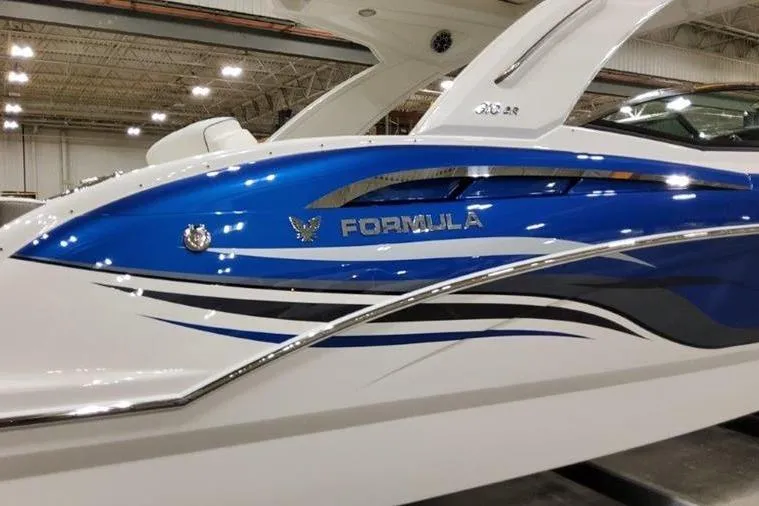 310 Bow Rider Yacht Photos Pics 2025 Formula 310 Bowrider I/O boat in a showroom.