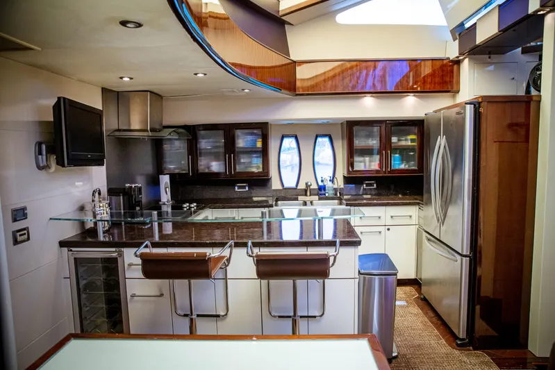 Lovin Life Yacht Photos Pics Luxurious kitchen interior of 2008 Lazzara LSX 75 yacht with modern appliances.