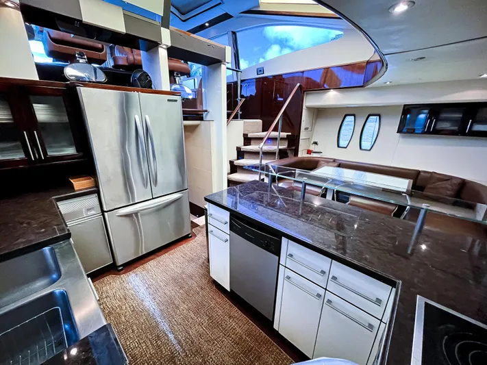 Lovin Life Yacht Photos Pics Luxurious 2008 Lazzara LSX 75 yacht interior with modern kitchen and sleek design.