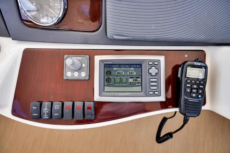  Yacht Photos Pics Control panel of a 2012 Meridian 441 Sedan yacht with navigation and communication equipment.