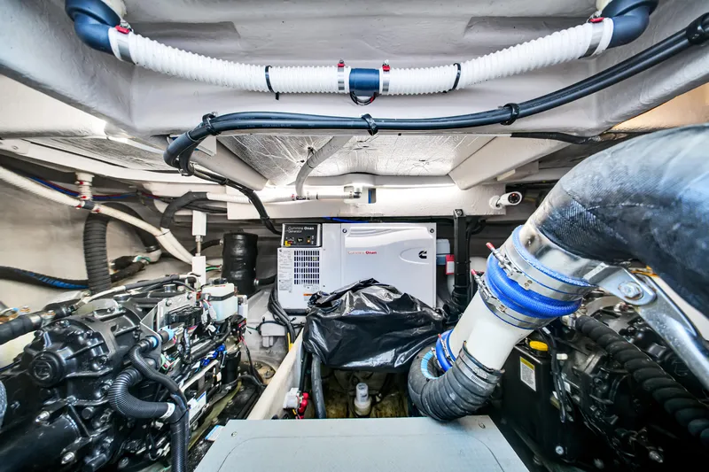  Yacht Photos Pics Engine room of 2012 Meridian 441 Sedan yacht, showcasing mechanical components and systems.