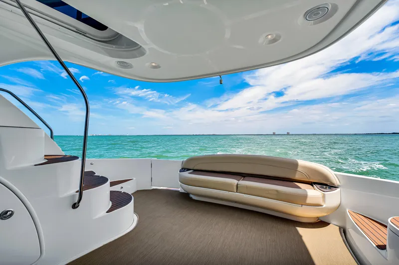  Yacht Photos Pics Luxurious 2012 Meridian 441 Sedan yacht interior with ocean view and elegant seating.