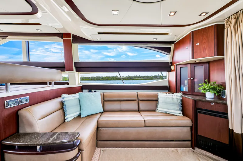  Yacht Photos Pics Luxurious interior of 2012 Meridian 441 Sedan yacht with leather seating and scenic windows.