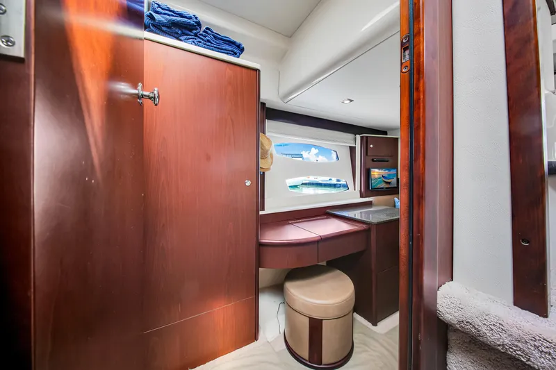  Yacht Photos Pics Luxurious interior of 2012 Meridian 441 Sedan yacht with wooden cabinetry and seating.