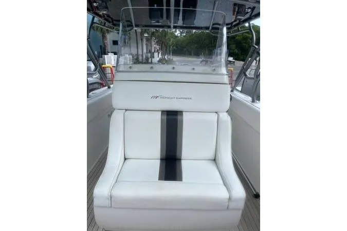  Yacht Photos Pics 2013 Midnight Express 39 Open boat with white seating and black stripe detail.