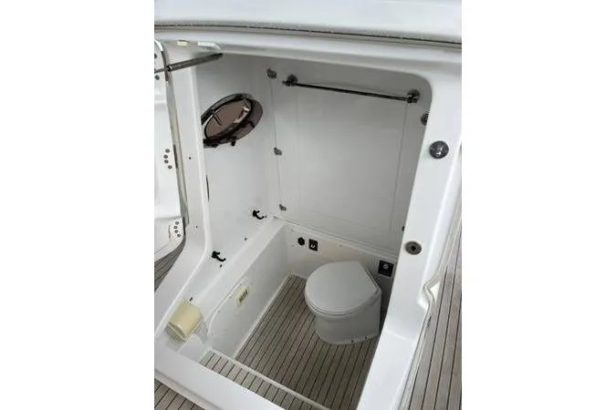  Yacht Photos Pics 2013 Midnight Express 39 Open boat bathroom interior with toilet and porthole.
