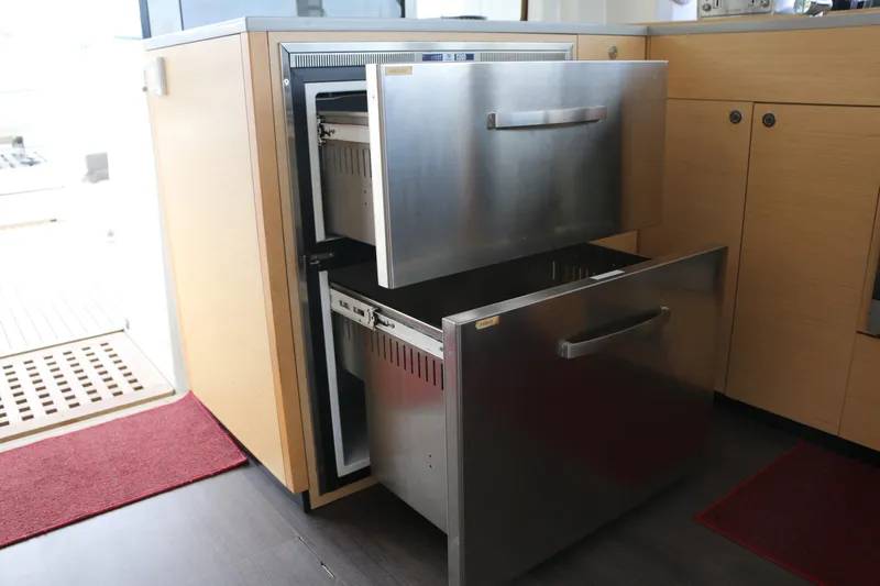 Nauti By Nature II Yacht Photos Pics Stainless steel drawer refrigerator in 2017 Lagoon 52 yacht kitchen.