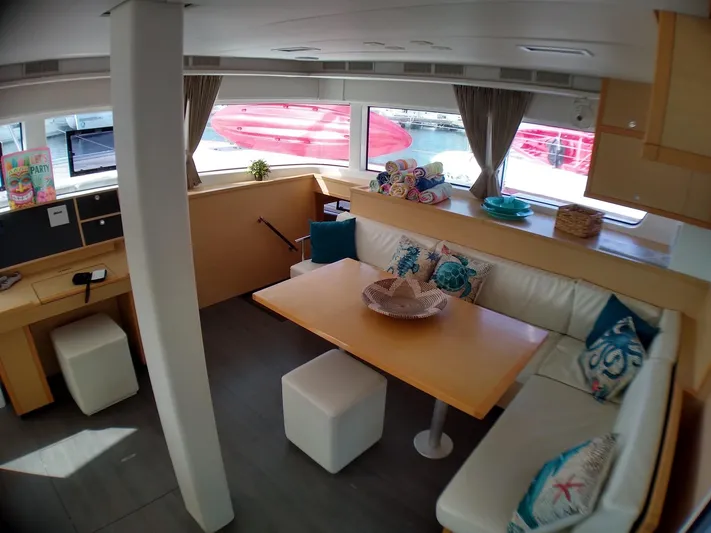 Nauti By Nature II Yacht Photos Pics Interior of 2017 Lagoon 52 yacht with modern seating and dining area.