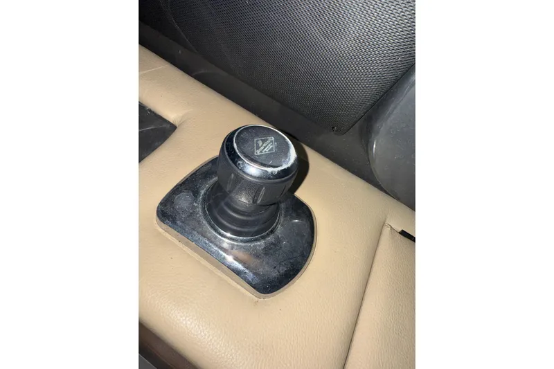  Yacht Photos Pics Control knob on a 2015 Sea Ray 350 SLX boat, mounted on beige panel.