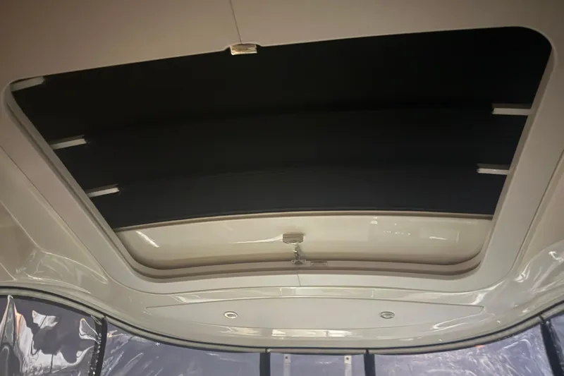  Yacht Photos Pics Interior view of 2015 Sea Ray 350 SLX boat's retractable sunroof.